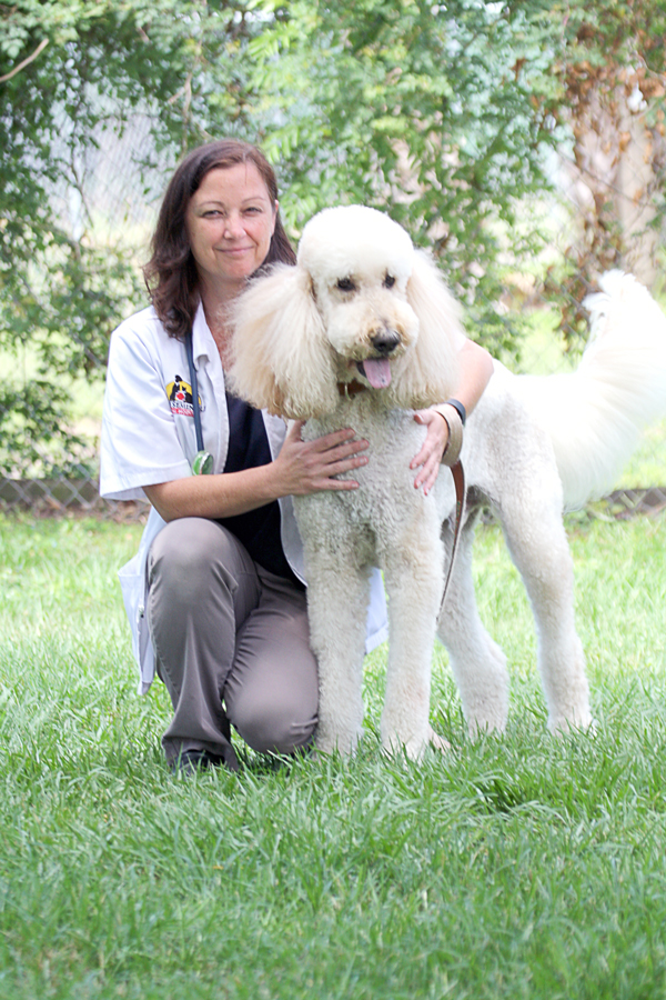 LSAH Vet with happy dog